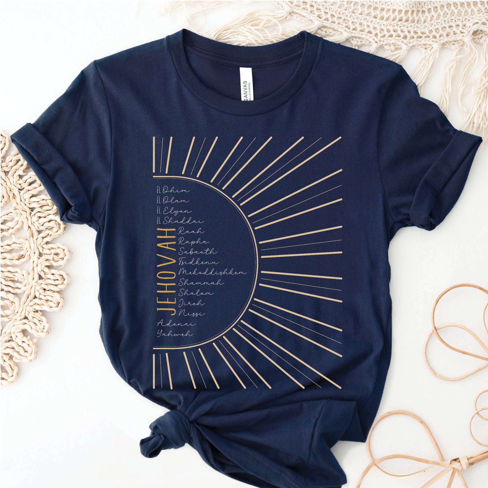 The Names of God Hebrew Christian Old Testament Bible List Sunshine T-Shirt, printed in gold and white on Navy Blue Bella-Canvas 3001 t-shirt, women's soft unisex fit regular and plus size tee
