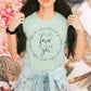 Faith based woman wearing May His Favor Be Upon family & children Numbers 6 The Blessing Christian aesthetic circle design printed on soft heather dusty blue t-shirt for women