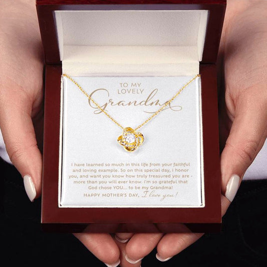 To my Lovely Grandma 18k gold sparkling cubic zirconia Love Knot necklace Mother's Day Gift to Grandmother with heart warming message card nestled inside luxury mahogany jewelry gift box