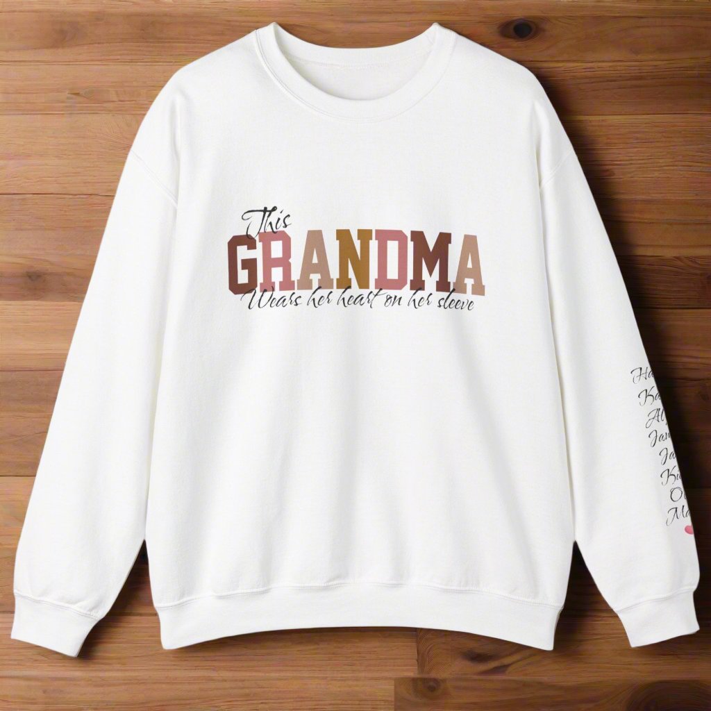 Personalized This GRANDMA Wears Her Heart On Her Sleeve Grandchildren names sleeve print white cozy trendy women's sweatshirt gift for Christmas, birthday or Mother's day