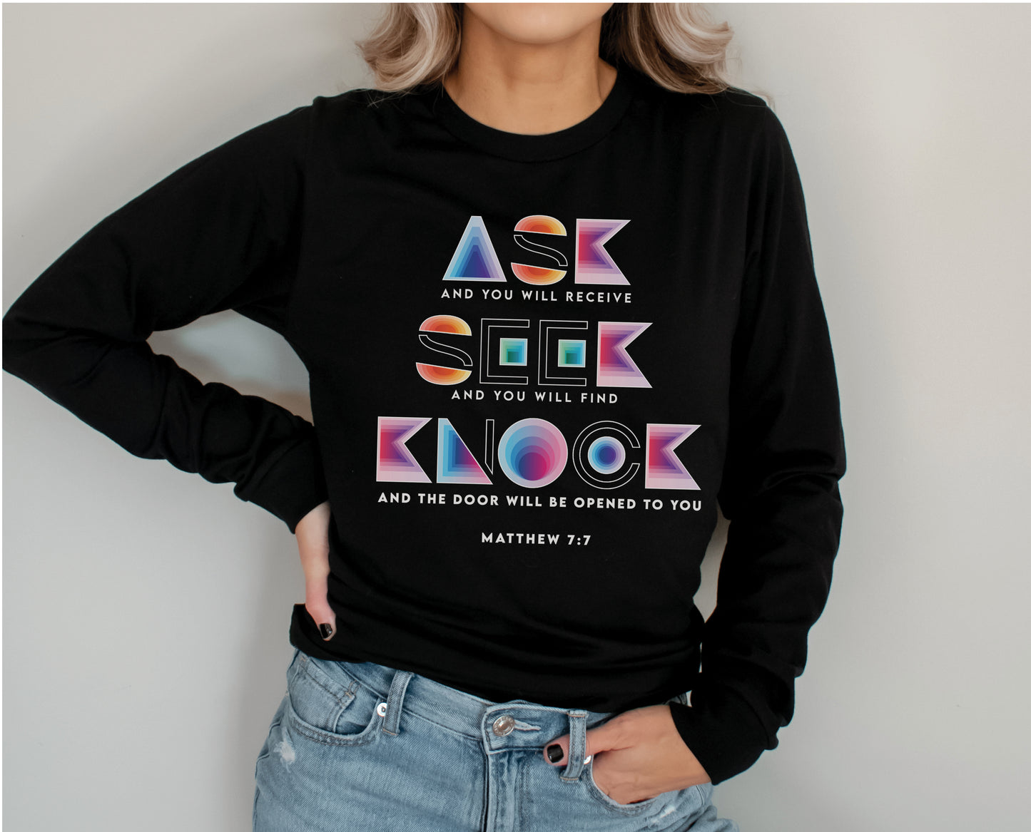 Ask Seek Knock Matthew 7:7 Christian aesthetic design printed in holographic colors on black soft long sleeve tee for men & women