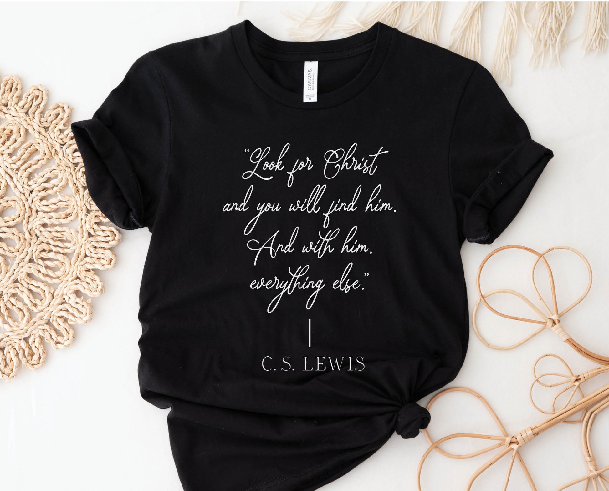 Soft quality black t-shirt with British writer Narnia author C.S. Lewis quote "Look for Christ and you will find him. And with him, everything else."  printed in white vintage script - Christian aesthetic unisex tee shirt design for women