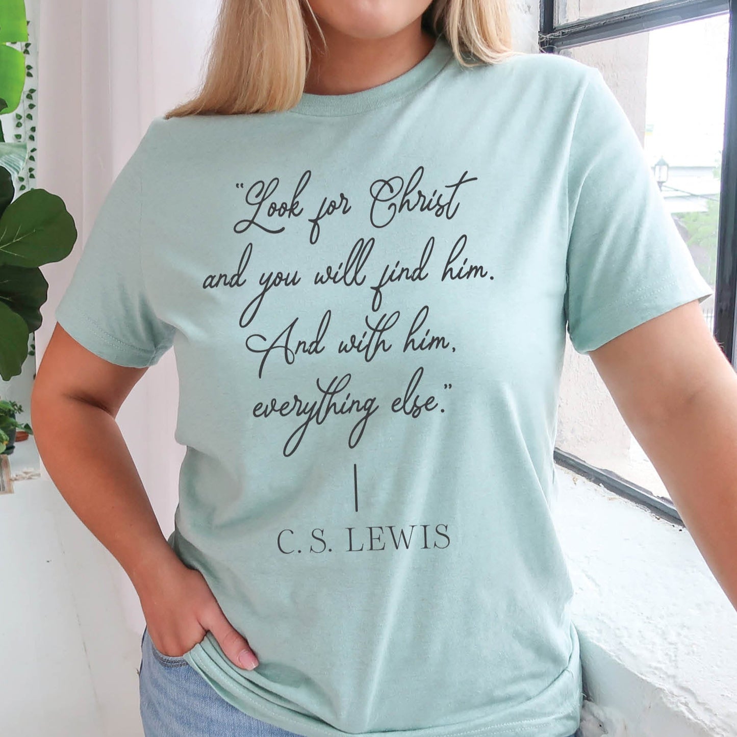 Soft quality heather dusty blue t-shirt with British writer Narnia author C.S. Lewis quote "Look for Christ and you will find him. And with him, everything else."  printed in black vintage script - Christian aesthetic unisex tee shirt design for women