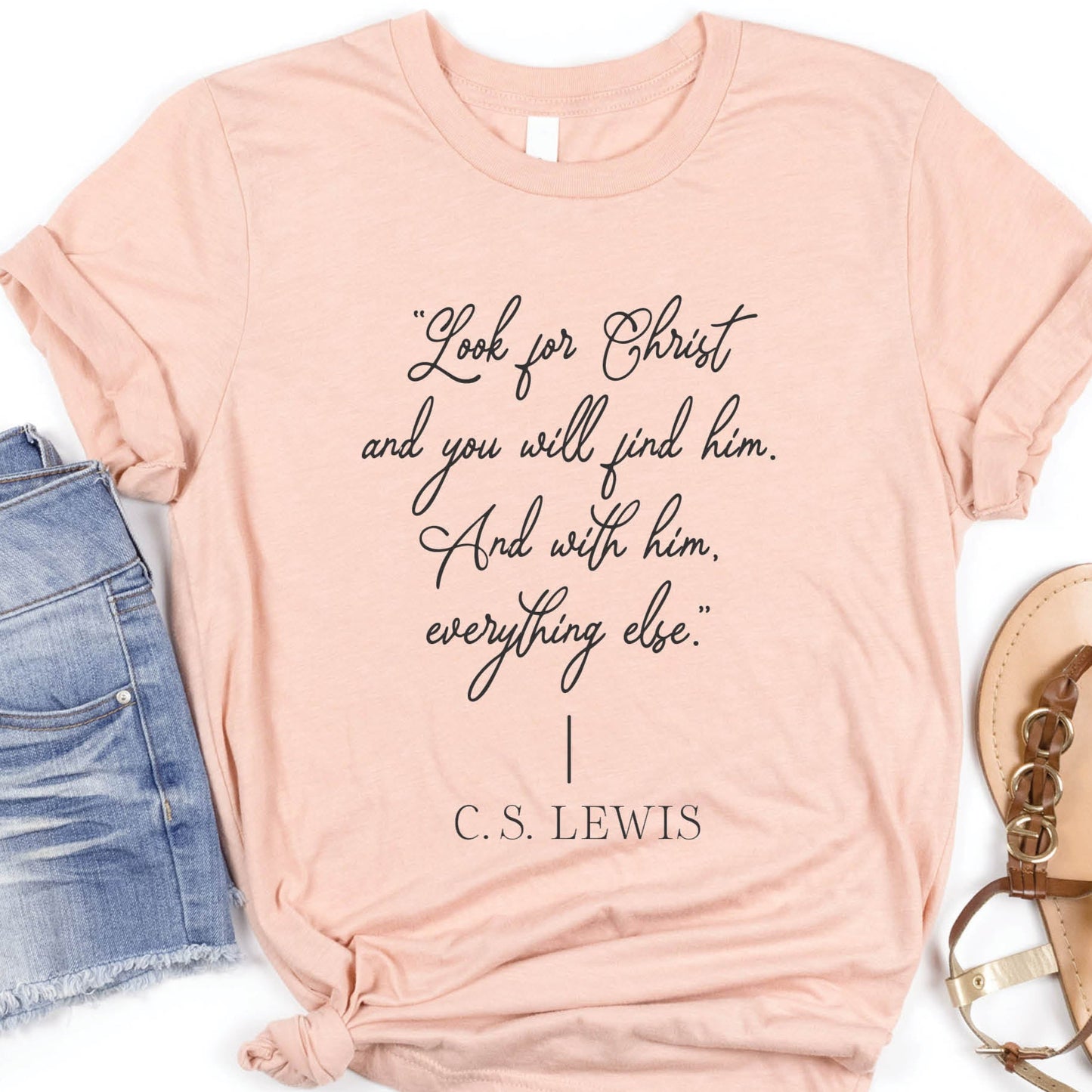Soft quality heather prism peach t-shirt with British writer Narnia author C.S. Lewis quote "Look for Christ and you will find him. And with him, everything else."  printed in black vintage script - Christian aesthetic unisex tee shirt design for women