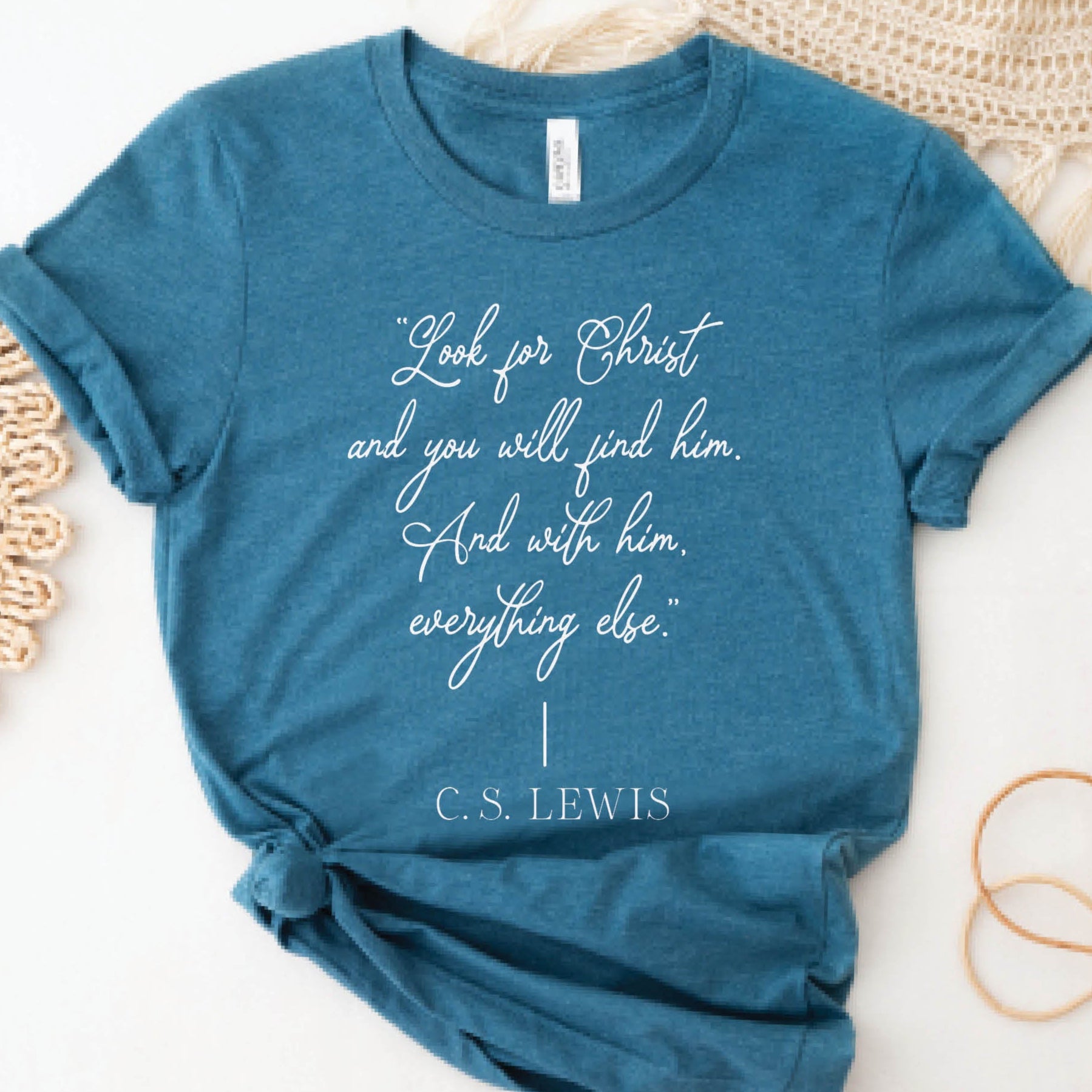 Soft quality heather deep teal t-shirt with British writer Narnia author C.S. Lewis quote "Look for Christ and you will find him. And with him, everything else."  printed in white vintage script - Christian aesthetic unisex tee shirt design for women