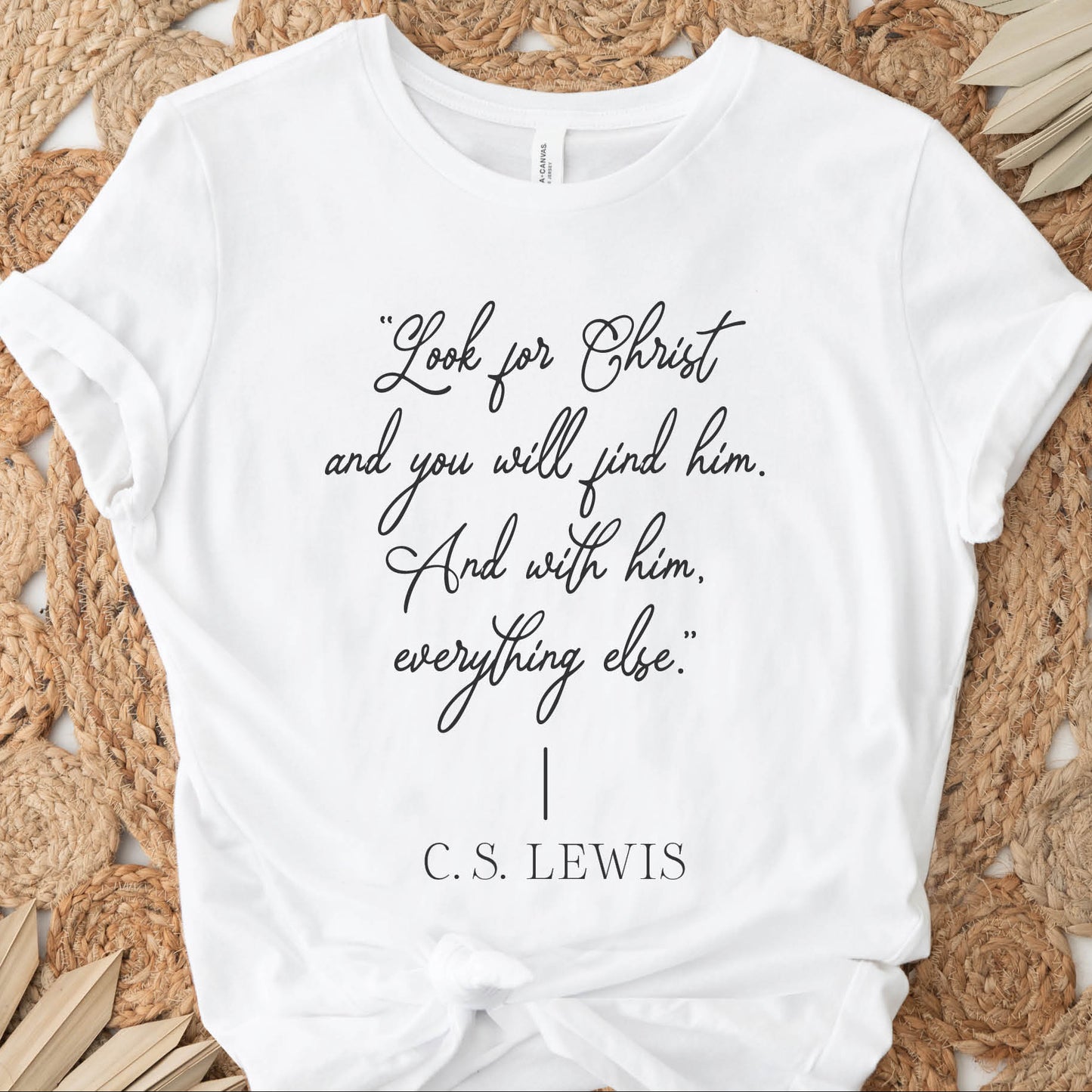 Soft quality white t-shirt with British writer Narnia author C.S. Lewis quote "Look for Christ and you will find him. And with him, everything else."  printed in black vintage script - Christian aesthetic unisex tee shirt design for women