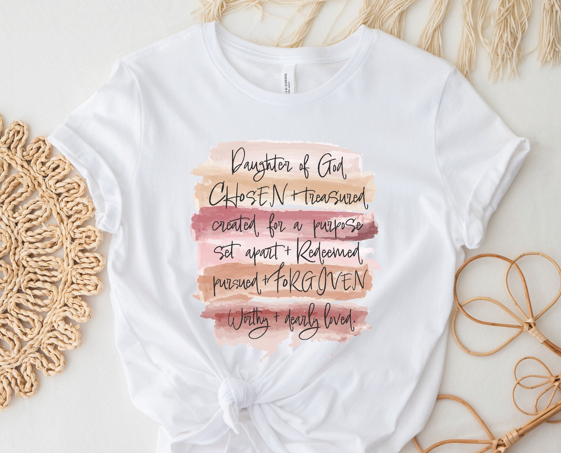 Daughter of God, Chosen, created for a purpose, redeemed, forgiven, worthy, loved, Christian woman aesthetic with watercolor splash background printed on soft white unisex t-shirt for women