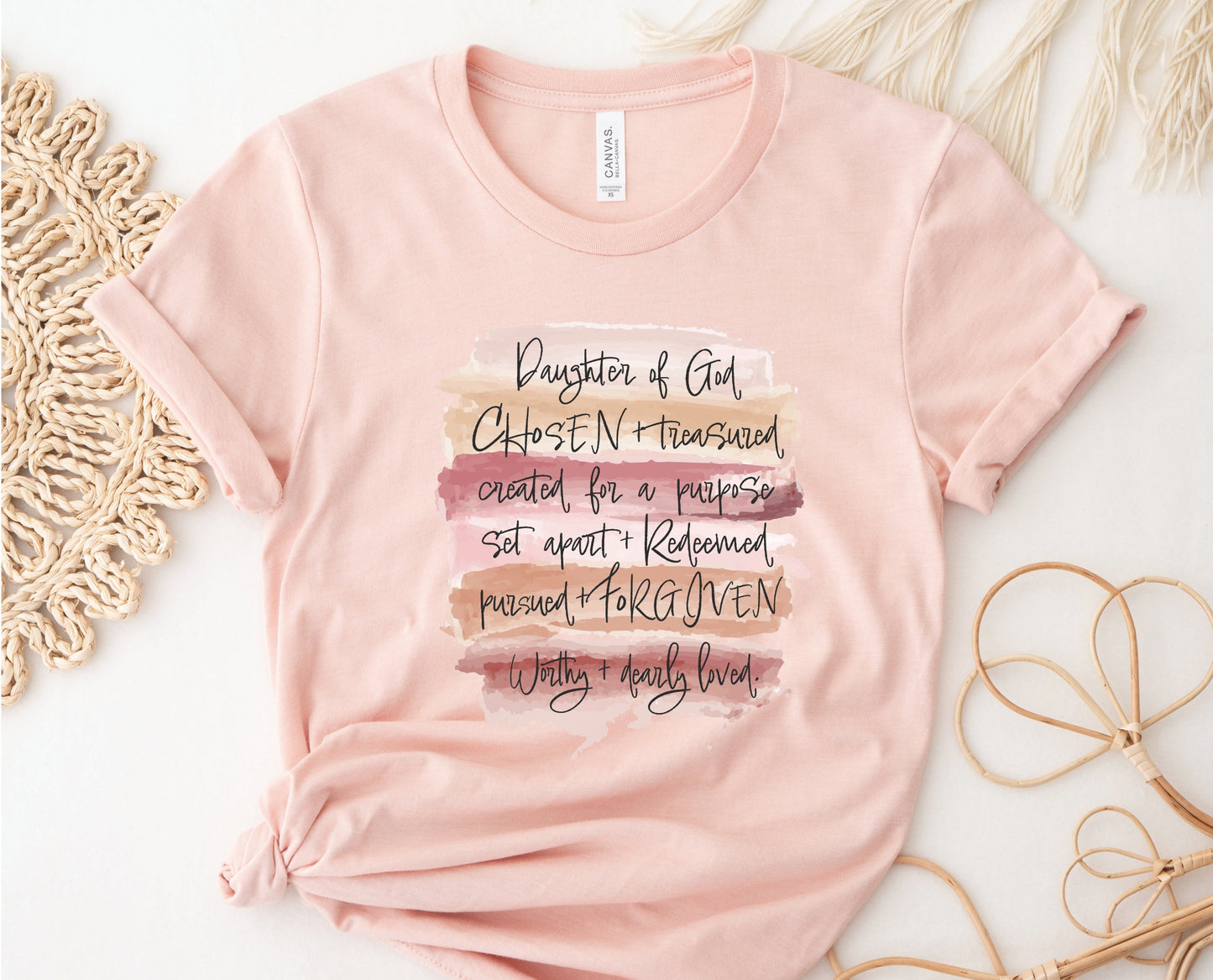 Daughter of God, Chosen, created for a purpose, redeemed, forgiven, worthy, loved, Christian woman aesthetic with neutral colors watercolor splash background printed on soft heather prism peach unisex t-shirt for women
