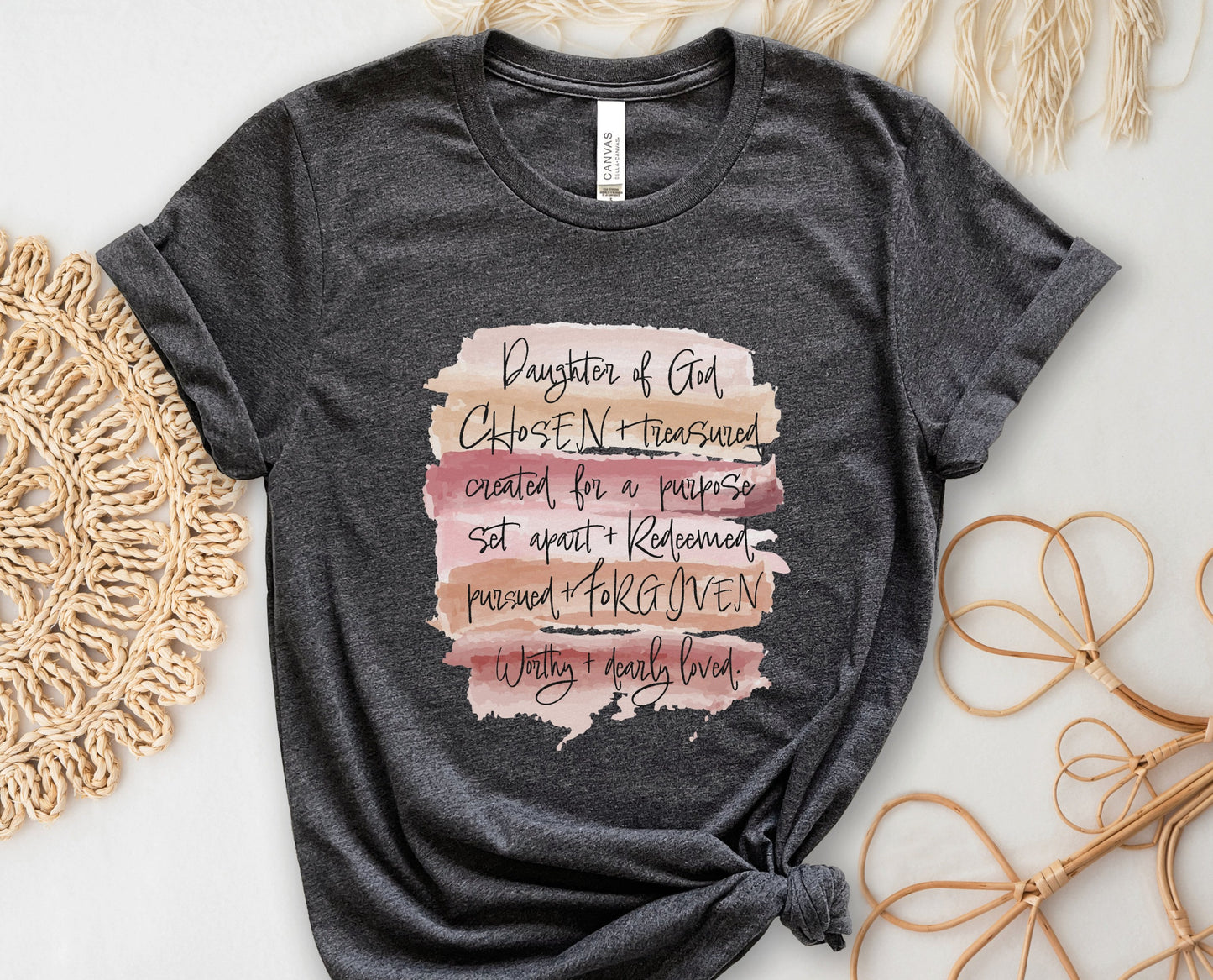 Daughter of God, Chosen, created for a purpose, redeemed, forgiven, worthy, loved, Christian woman aesthetic with neutral colors watercolor splash background printed on soft heather dark gray unisex t-shirt for women