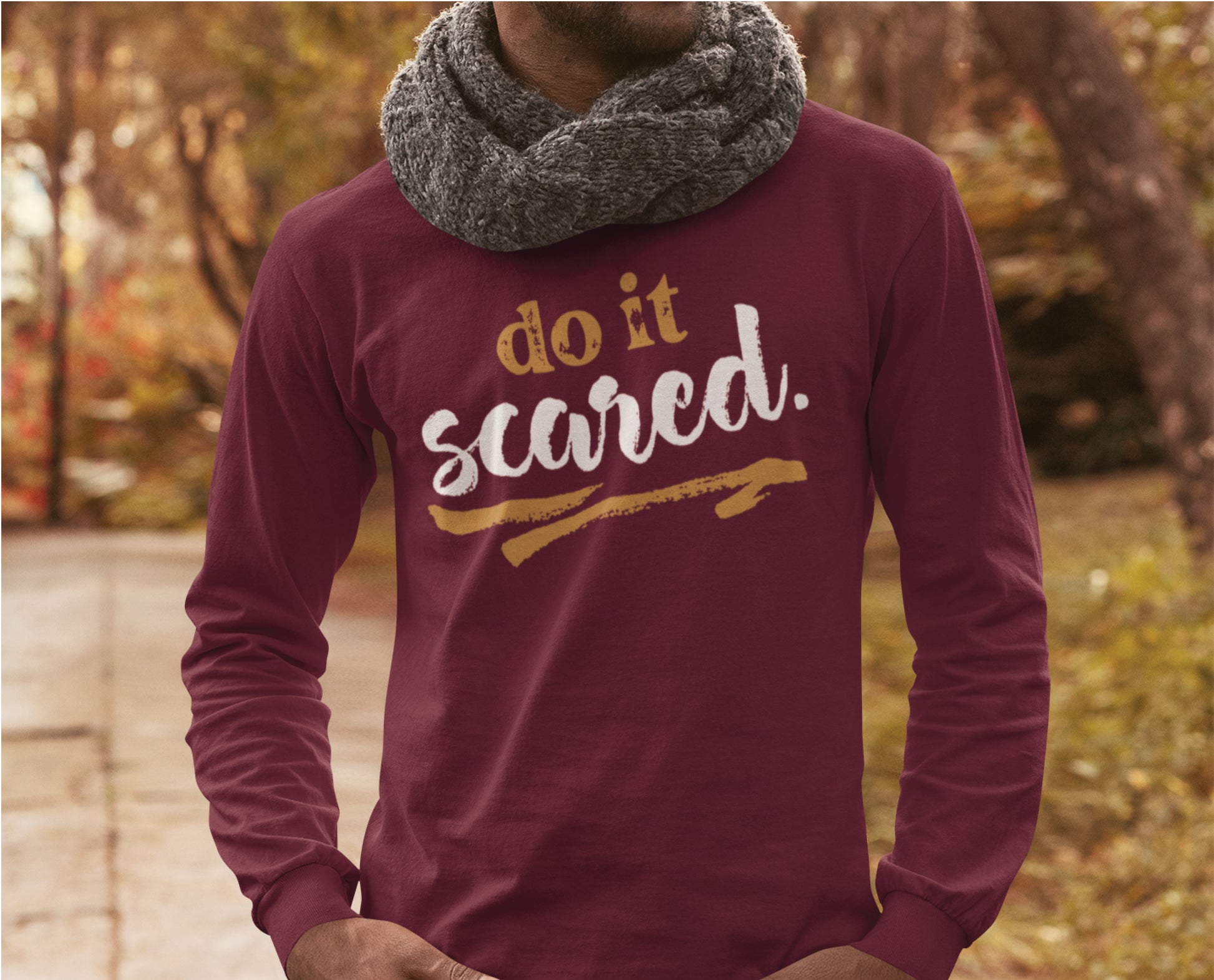 Do It Scared faith over fear 2 Timothy 1:7 do not fear bible verse Christian aesthetic design printed in white and gold on soft maroon unisex long sleeve tee shirt for women and men