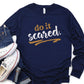 Do It Scared faith over fear 2 Timothy 1:7 do not fear bible verse Christian aesthetic design printed in white and gold on soft navy blue unisex long sleeve tee shirt for women and men