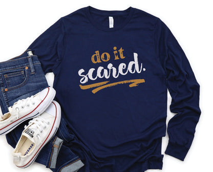 Do It Scared faith over fear 2 Timothy 1:7 do not fear bible verse Christian aesthetic design printed in white and gold on soft navy blue unisex long sleeve tee shirt for women and men