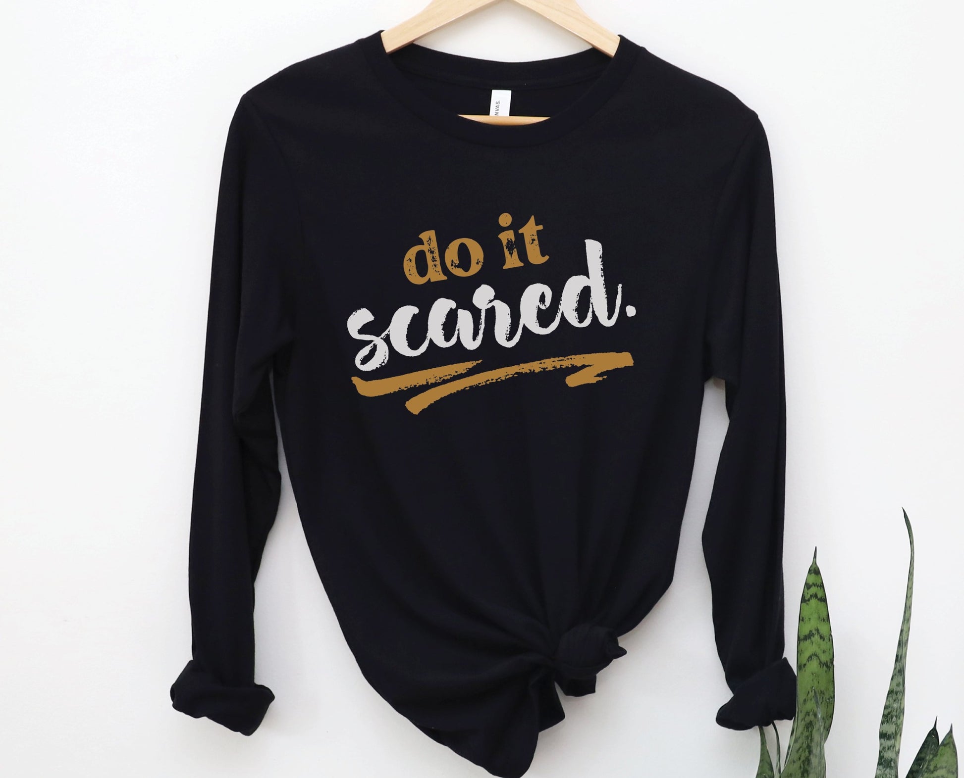 Do It Scared faith over fear 2 Timothy 1:7 do not fear bible verse Christian aesthetic design printed in white and gold on soft black unisex long sleeve tee shirt for women and men