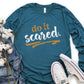Do It Scared faith over fear 2 Timothy 1:7 do not fear bible verse Christian aesthetic design printed in white and gold on soft heather deep teal unisex long sleeve tee shirt for women and men