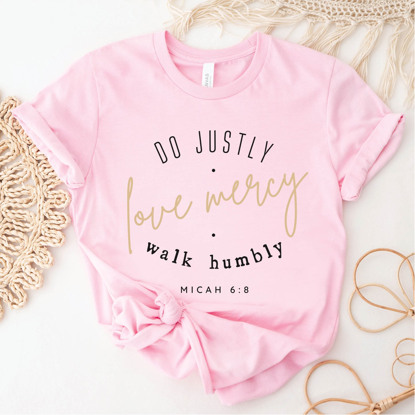 Pink Christian aesthetic faith-based unisex t-shirt for women with Micah 6:8 bible verse scripture printed that says, Do Justly Love Mercy walk humbly, in gold and black, unique gift for her