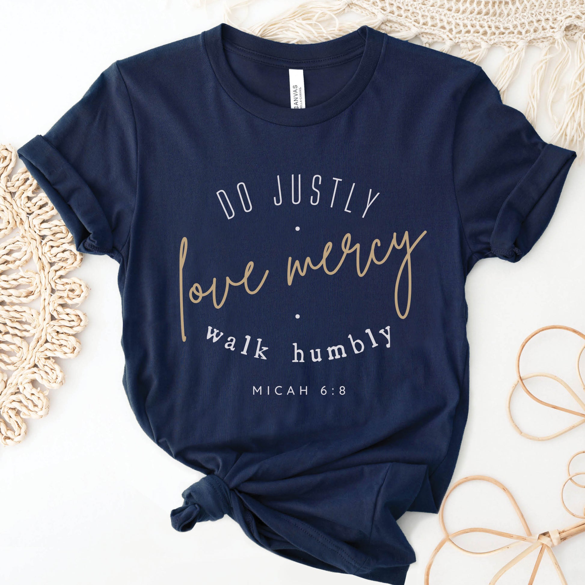 Navy Blue Christian aesthetic faith-based unisex t-shirt for women with Micah 6:8 bible verse scripture printed that says, Do Justly Love Mercy walk humbly in gold and white, designed for women in sizes small thru 4X