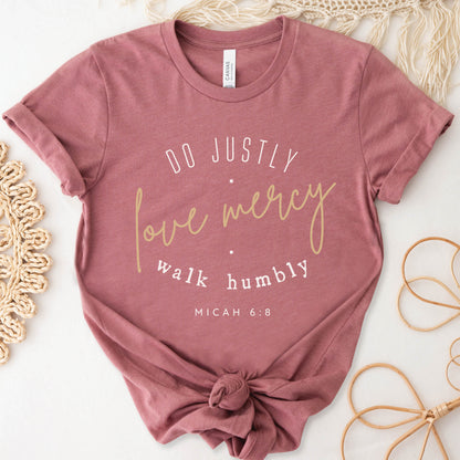 Mauve Dusty Pink Christian aesthetic faith-based unisex t-shirt for women with Micah 6:8 bible verse scripture printed that says, Do Justly Love Mercy walk humbly in gold and white, designed for women in sizes small thru 4X