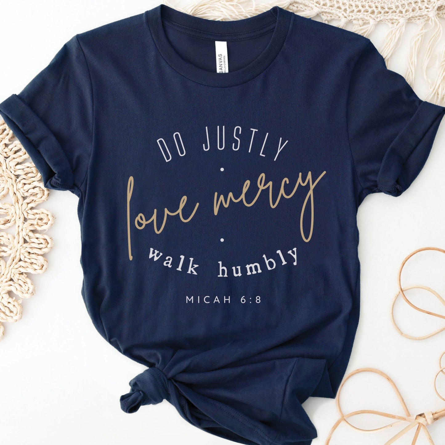 Navy Blue Christian aesthetic faith-based unisex t-shirt for women with Micah 6:8 bible verse scripture printed that says, Do Justly Love Mercy walk humbly in gold and white, designed for women in sizes small thru 4X