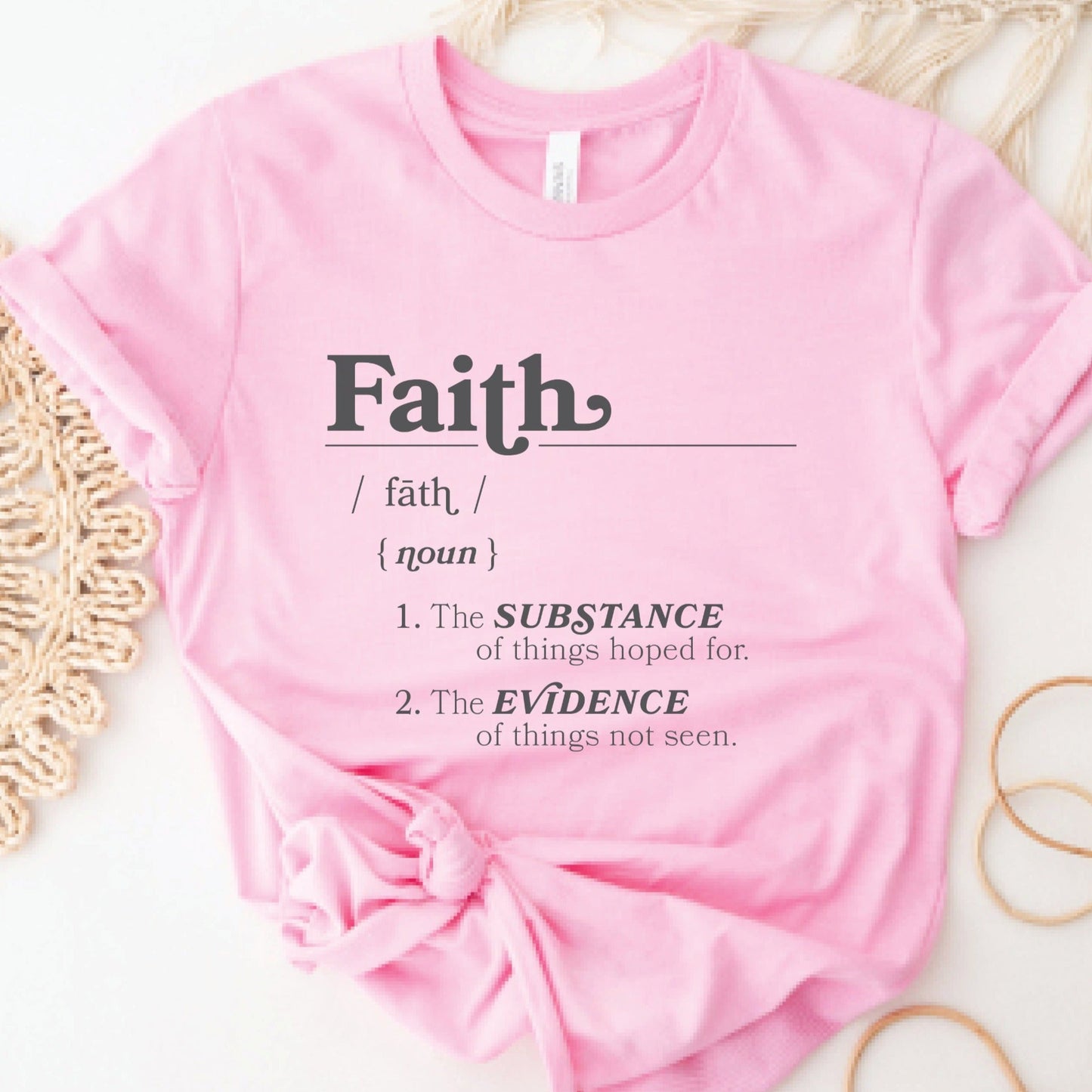 Faith Definition Hebrews 11:1 Christian aesthetic design printed in charcoal gray on soft pink unisex t-shirt for women and men