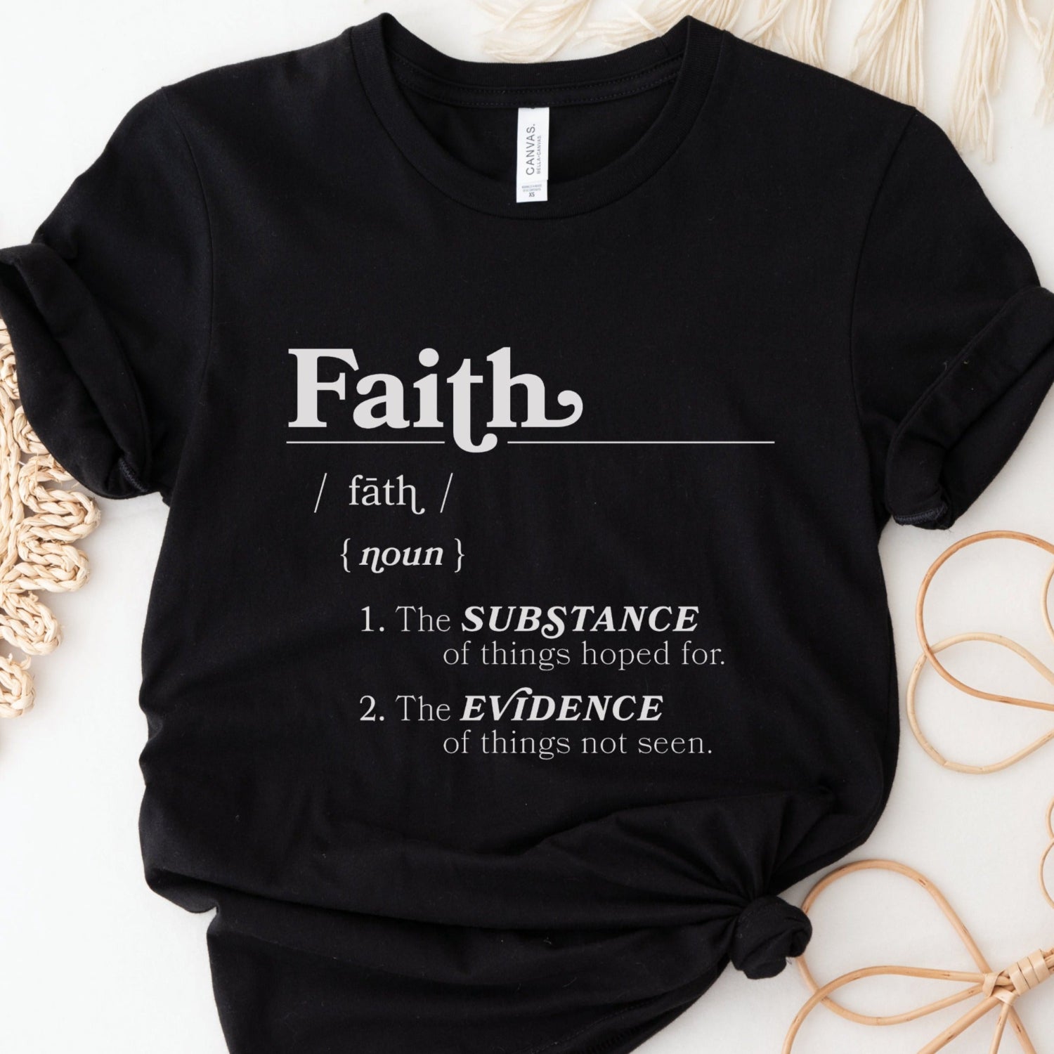 Faith Definition Hebrews 11:1 Christian aesthetic design printed in white on soft black unisex t-shirt for women and men