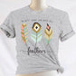 Psalm 91:4 "He Will Cover You With His Feathers" boho bible verse Christian woman aesthetic with teal peach and gold feathers printed on soft heather gray unisex t-shirt for women