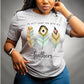 Stylish African American woman wearing Psalm 91:4 "He Will Cover You With His Feathers" boho bible verse Christian woman aesthetic with teal peach and gold feathers printed on soft heather gray unisex t-shirt for women
