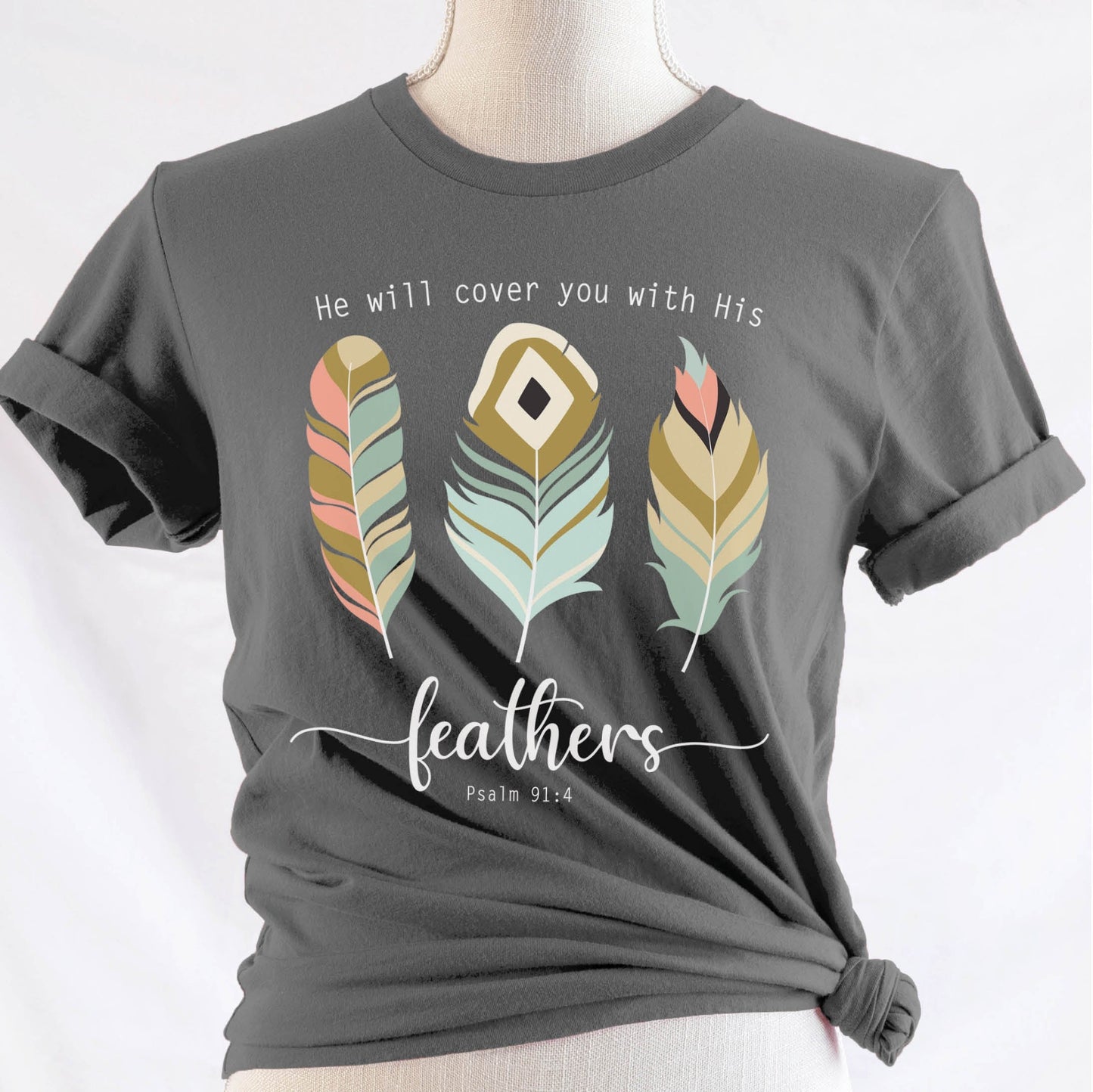 Psalm 91:4 "He Will Cover You With His Feathers" boho bible verse Christian woman aesthetic with teal peach and gold feathers printed on soft asphalt gray unisex t-shirt for women