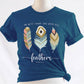Psalm 91:4 "He Will Cover You With His Feathers" boho bible verse Christian woman aesthetic with teal peach and gold feathers printed on soft heather deep teal unisex t-shirt for women