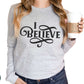 I Believe Swirl Christian aesthetic faith statement design printed in black on soft athletic heather gray long sleeve tee for women