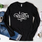 I Believe Swirl Christian aesthetic Jesus believer design printed in white on soft black long sleeve tee for women