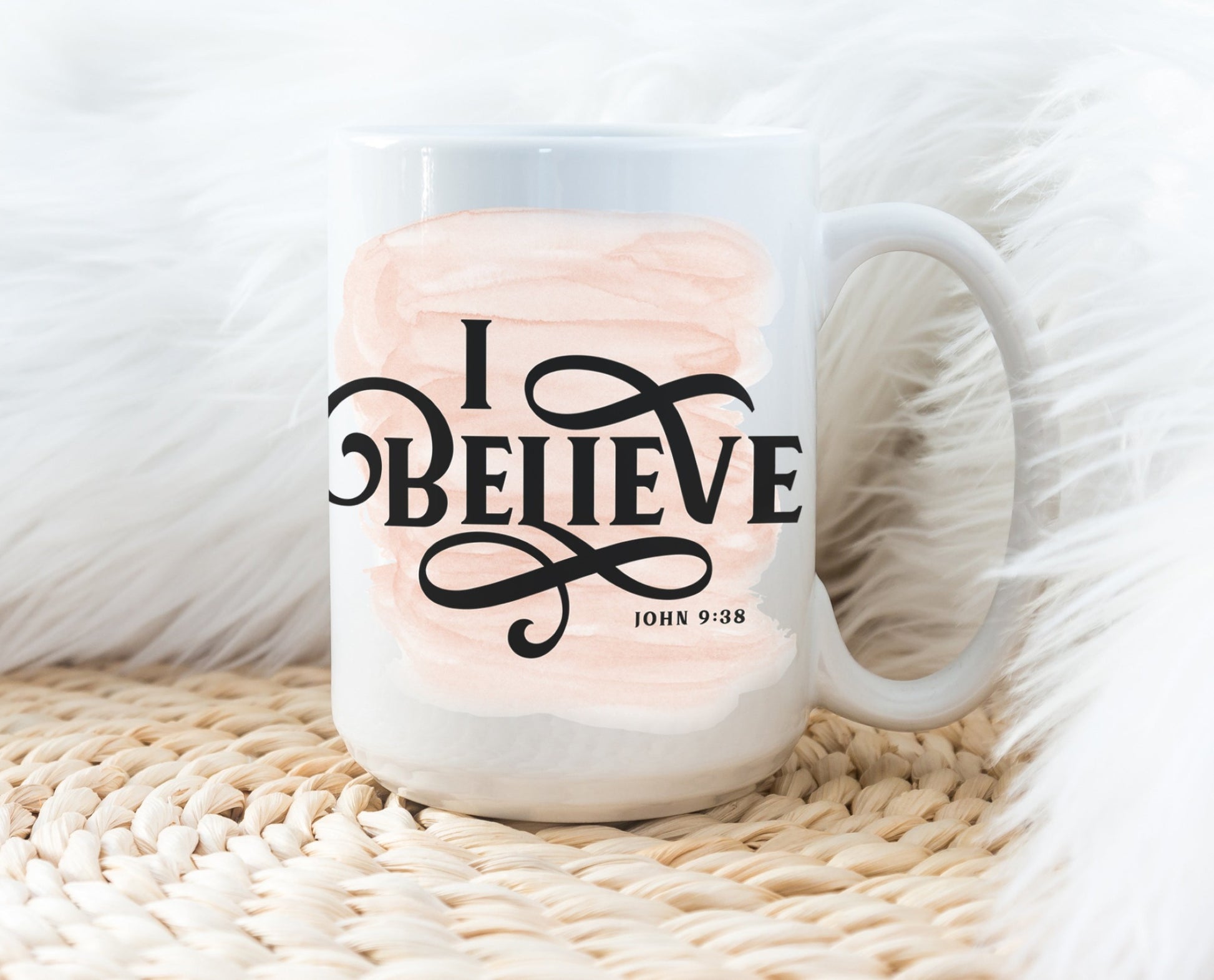 I Believe Swirl faith based Christian aesthetic John 9 bible verse peach pink watercolor splash background printed on white 15 oz. sturdy ceramic mug