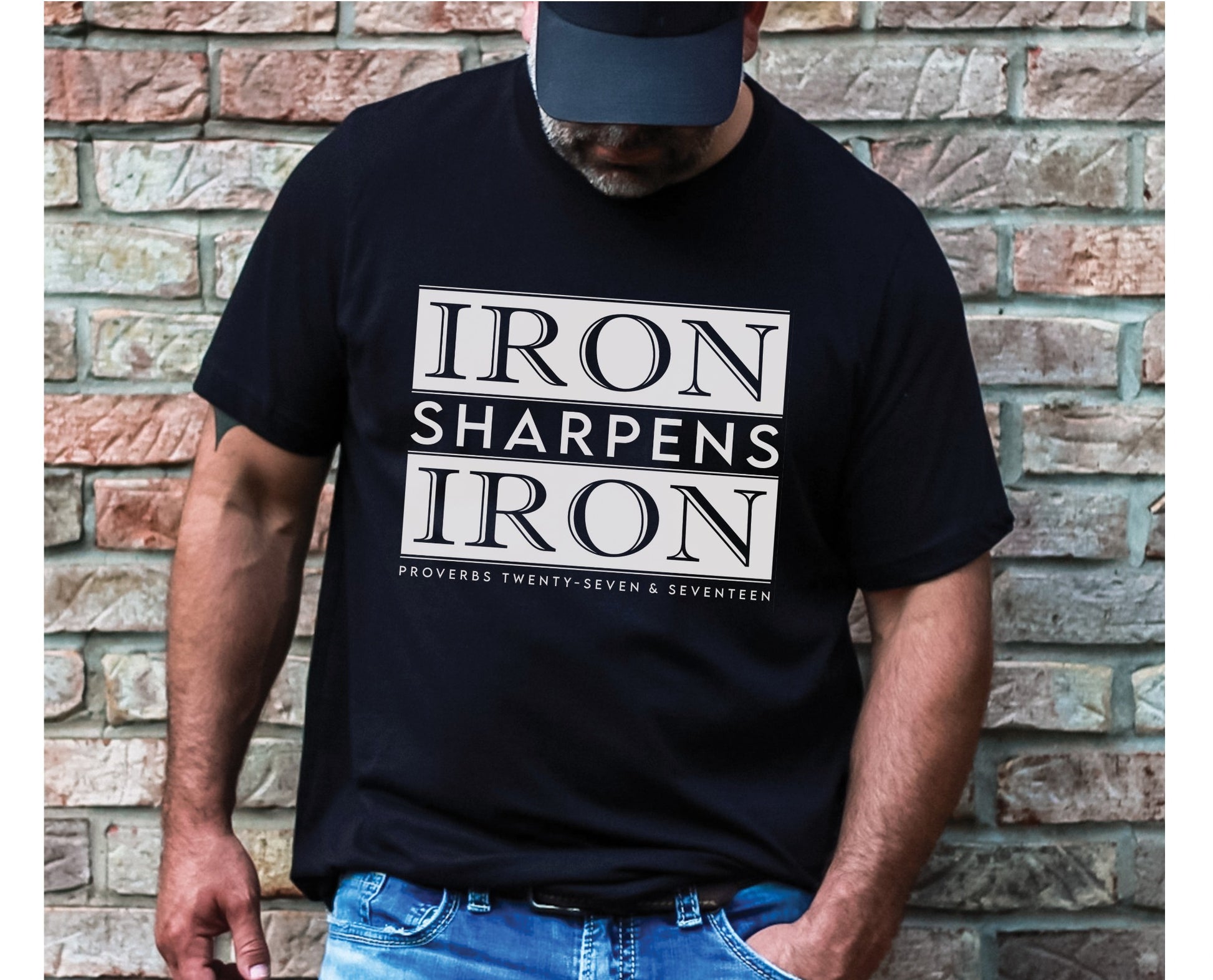 Iron Sharpens Iron Proverbs 27:17 Christian aesthetic block style design printed in white on soft black unisex t-shirt for men's groups
