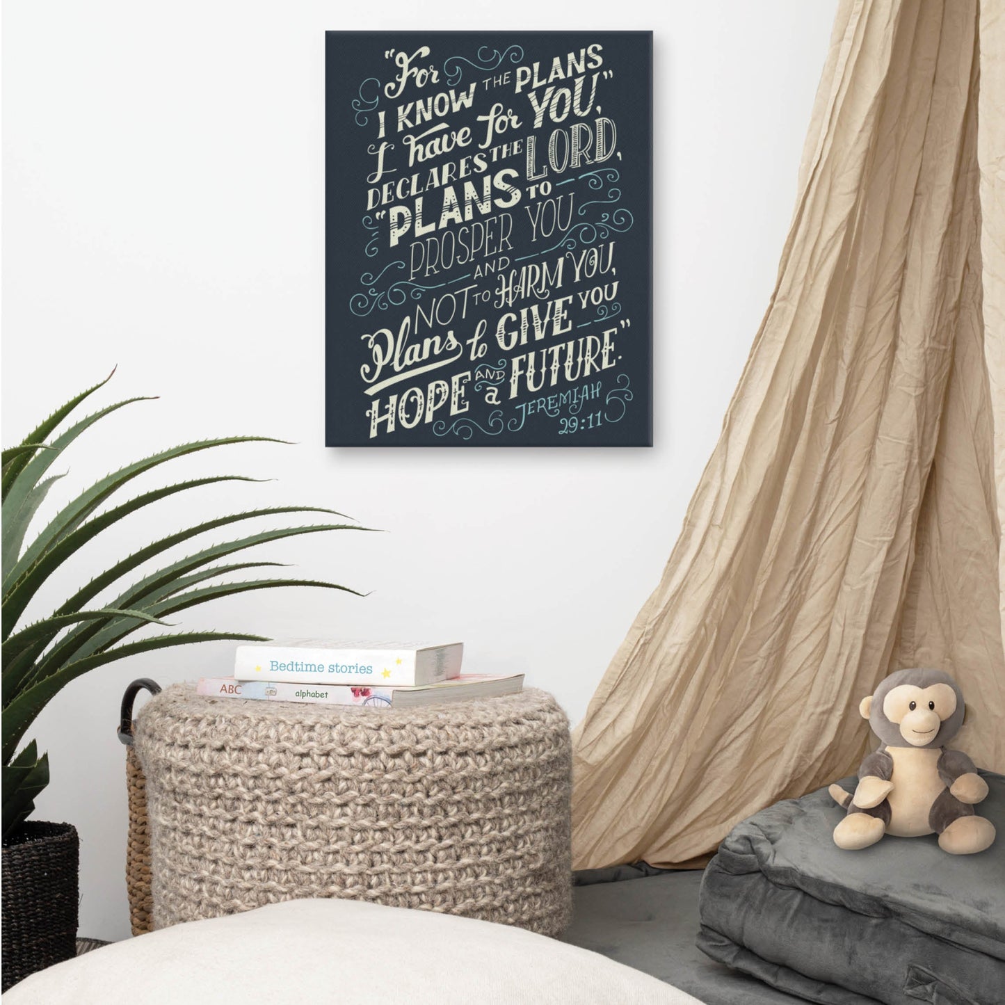 A 12x16" canvas wall art print featuring the text of Jeremiah 29:11 Bible verse in  cream and teal color typography and hand drawn swirl design elements with a rich navy blue background for home, church, or office decor, presented hanging on a neutral color nursery child's bedroom wall