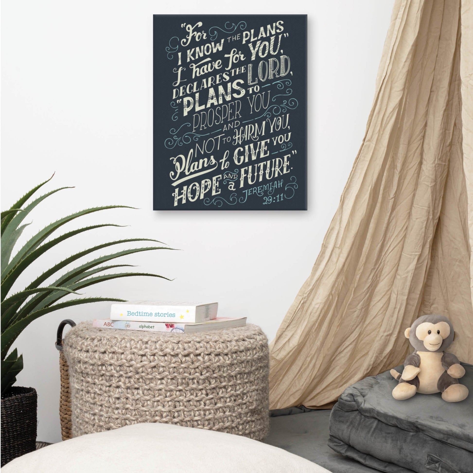 A 12x16" canvas wall art print featuring the text of Jeremiah 29:11 Bible verse in  cream and teal color typography and hand drawn swirl design elements with a rich navy blue background for home, church, or office decor, presented hanging on a neutral color nursery child's bedroom wall