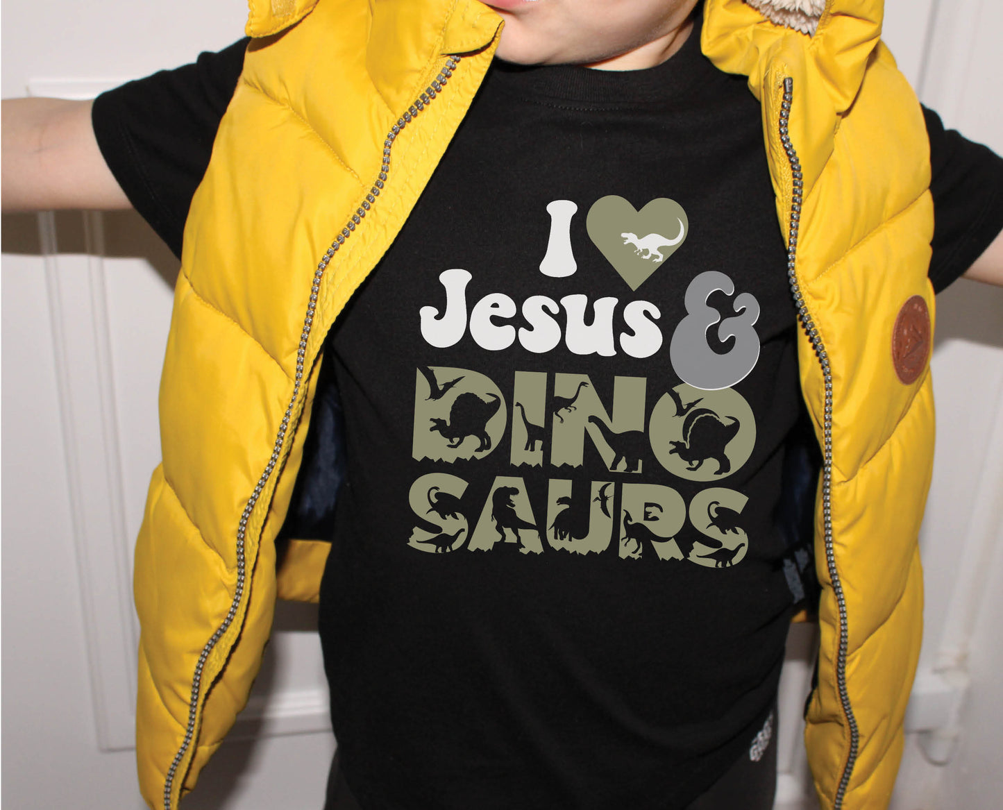 I Love Jesus and Dinosaurs cute Christian aesthetic soft toddler size kids t-shirt for boys in white, black, heather gray, and navy blue