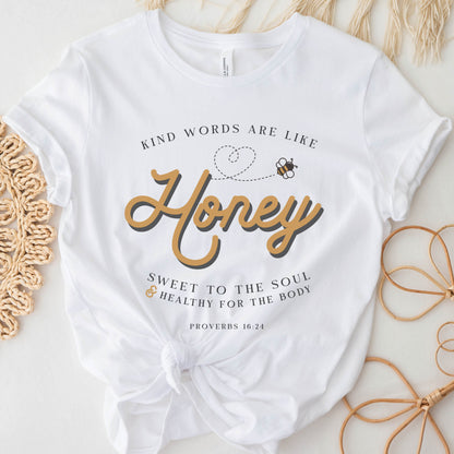 White and gold Christian aesthetic unisex faith-based kindness bee t-shirt for women with Proverbs 16:24 bible verse quote that says, "Kind Words Are Like Honey, Sweet To the Soul, and Healthy For the Body" 