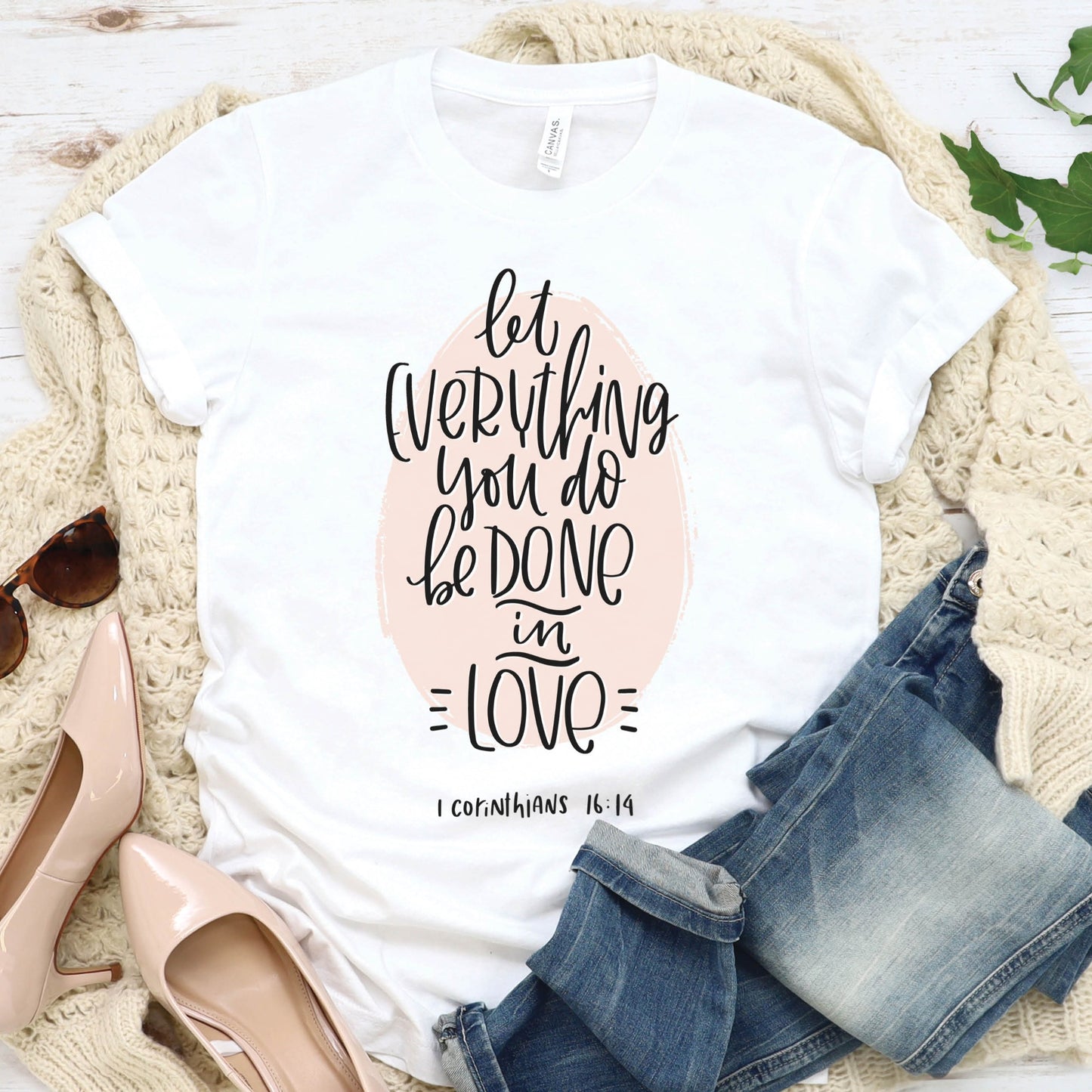 Soft quality white t-shirt with 1 Corinthians 16:14 Let Everything You Do Be Done In Love bible verse printed in blush pink and black - Christian aesthetic unisex tee shirt design for women