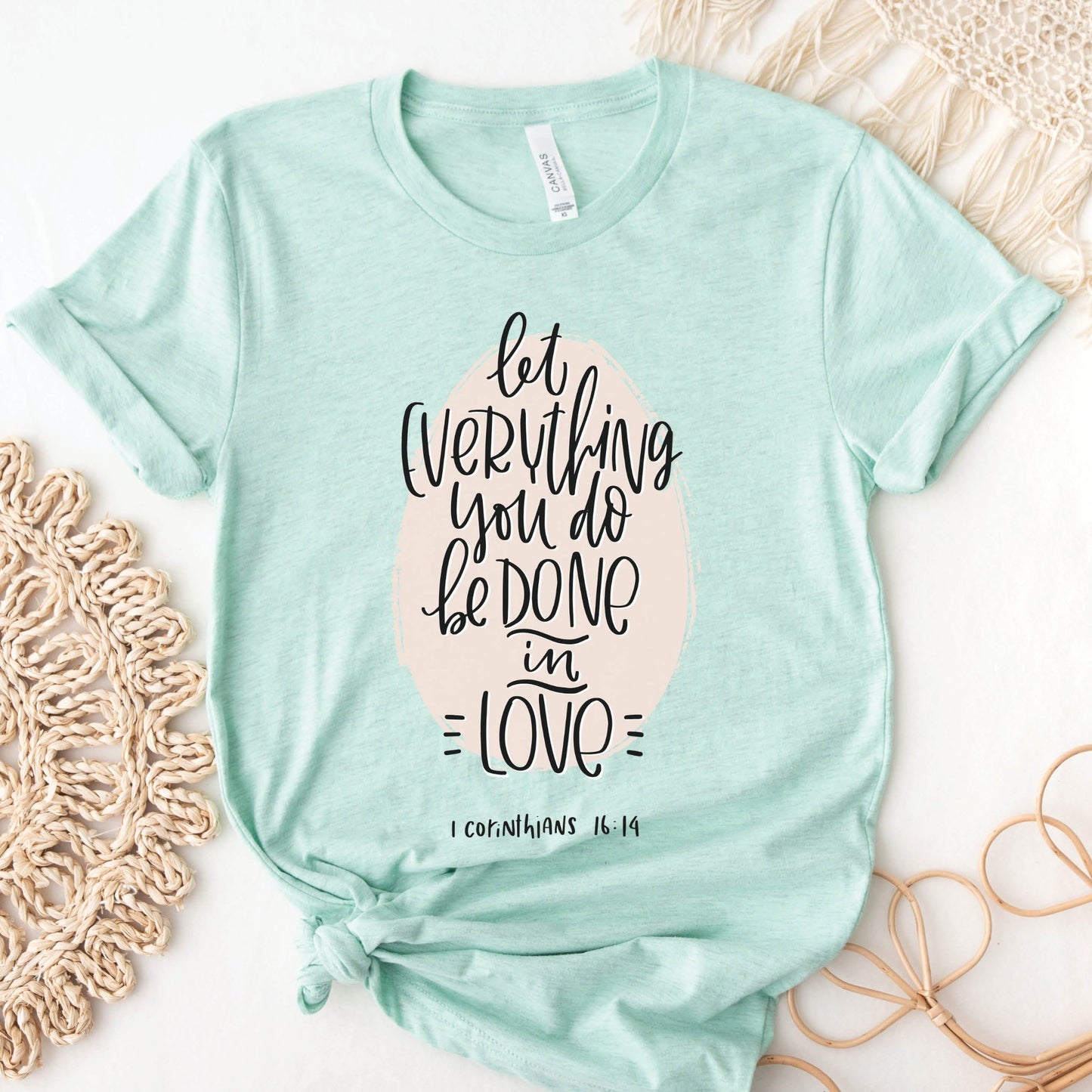 Soft quality heather prism mint green t-shirt with 1 Corinthians 16:14 Let Everything You Do Be Done In Love bible verse printed in blush pink and black - Christian aesthetic unisex tee shirt design for women