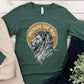 Lion of Judah Prepare the Way Isaiah 40:3 Christian aesthetic design printed in white and gold on soft heather forest green long sleeve tee for men & women
