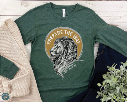 Lion of Judah Prepare the Way Isaiah 40:3 Christian aesthetic design printed in white and gold on soft heather forest green long sleeve tee for men & women