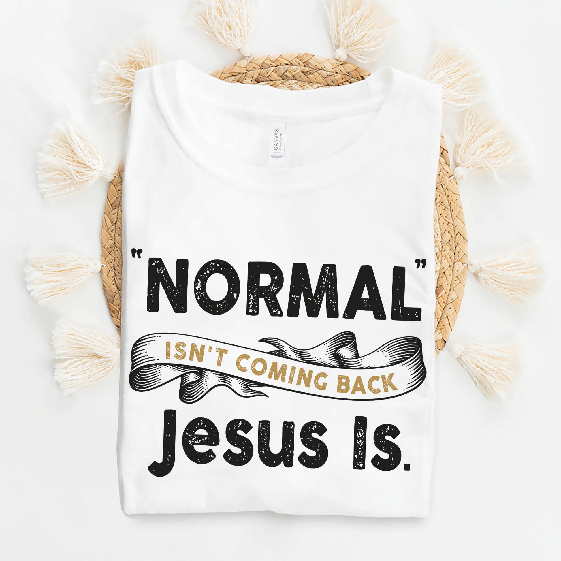 White Bella Canvas Christian Revival aesthetic unisex T-Shirt that says, Normal Isn't Coming Back, Jesus Is printed in black and gold, Jesus church graphic tees gift designed for men and women