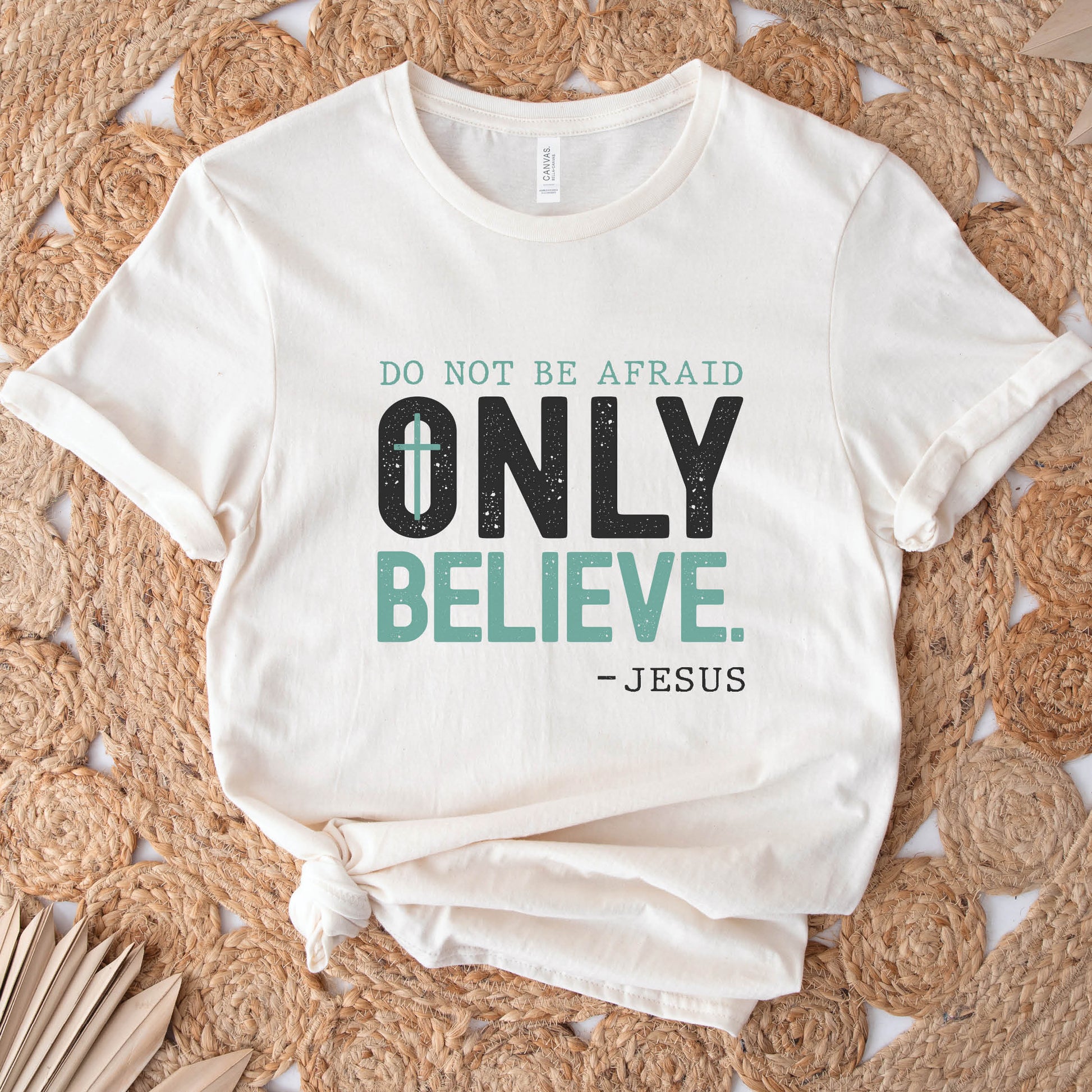 Do Not Be Afraid, Only Believe, Jesus Quote Christian aesthetic Mark 5:36 healing miracle bible verse textured black and teal wording printed on soft cream unisex t-shirt for men and women
