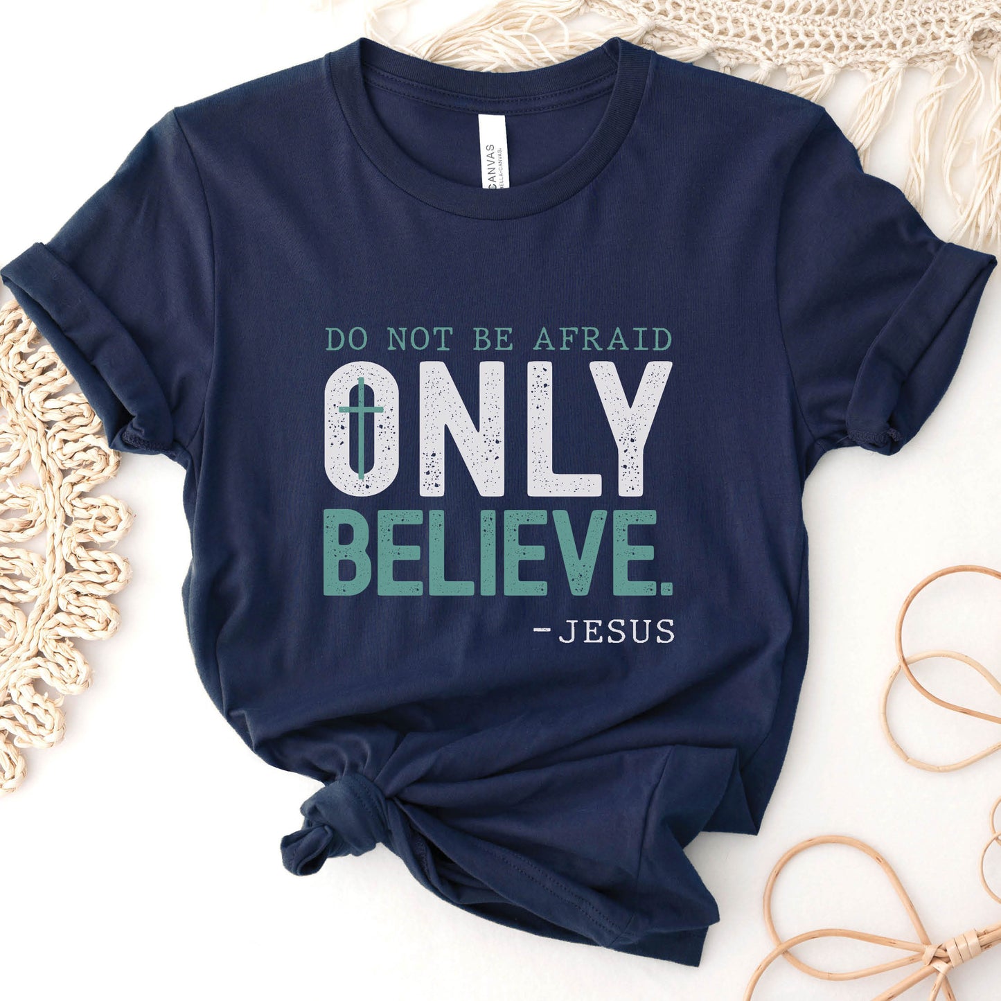 Do Not Be Afraid, Only Believe, Jesus Quote Christian aesthetic Mark 5:36 healing miracle bible verse textured white and teal wording printed on soft navy blue unisex t-shirt for men and women
