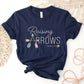 Navy blue and pastel boho arrow Christian aesthetic faith-based t-shirt with Psalm 127:3-5 bible verse quote that says "Raising Arrows" blessed is the one with a quiver full of children, perfect for homeschool moms and kids