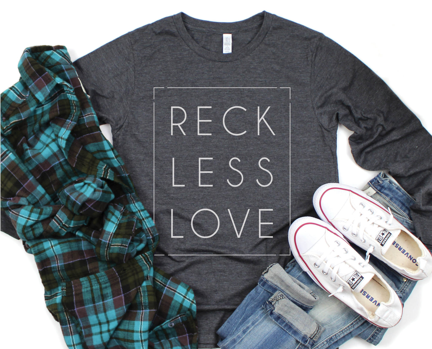 Rectangle Reckless Love Christian aesthetic worship design printed in white on cozy heather dark gray unisex long sleeve tee shirt for men and women