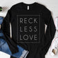 Rectangle Reckless Love Christian aesthetic worship design printed in white on cozy black unisex long sleeve tee shirt for men and women