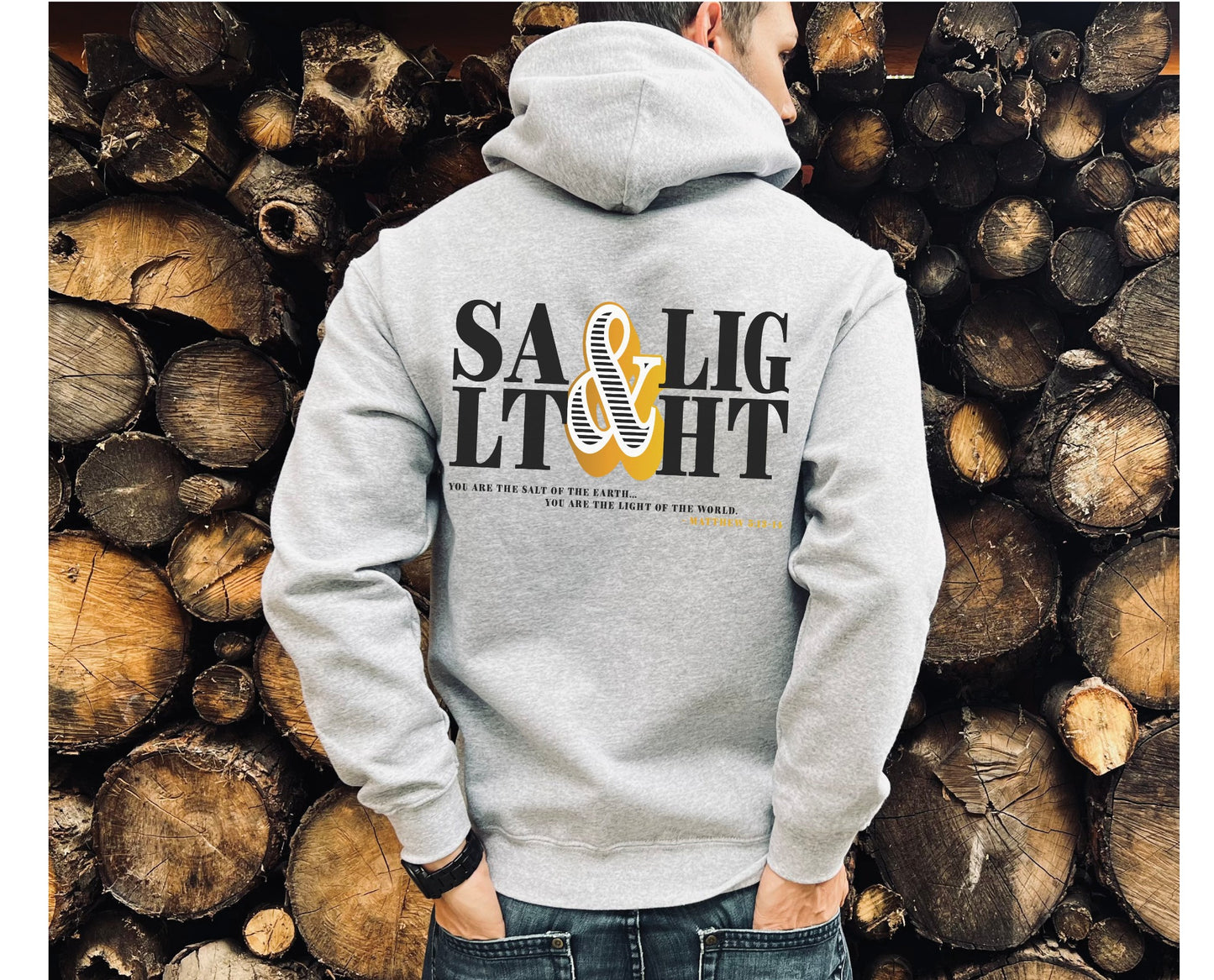Retro Stacked Salt And Light Matthew 5 Christian bible verse design printed on front and back in black and gold on cozy heather gray unisex hoodie for men and women