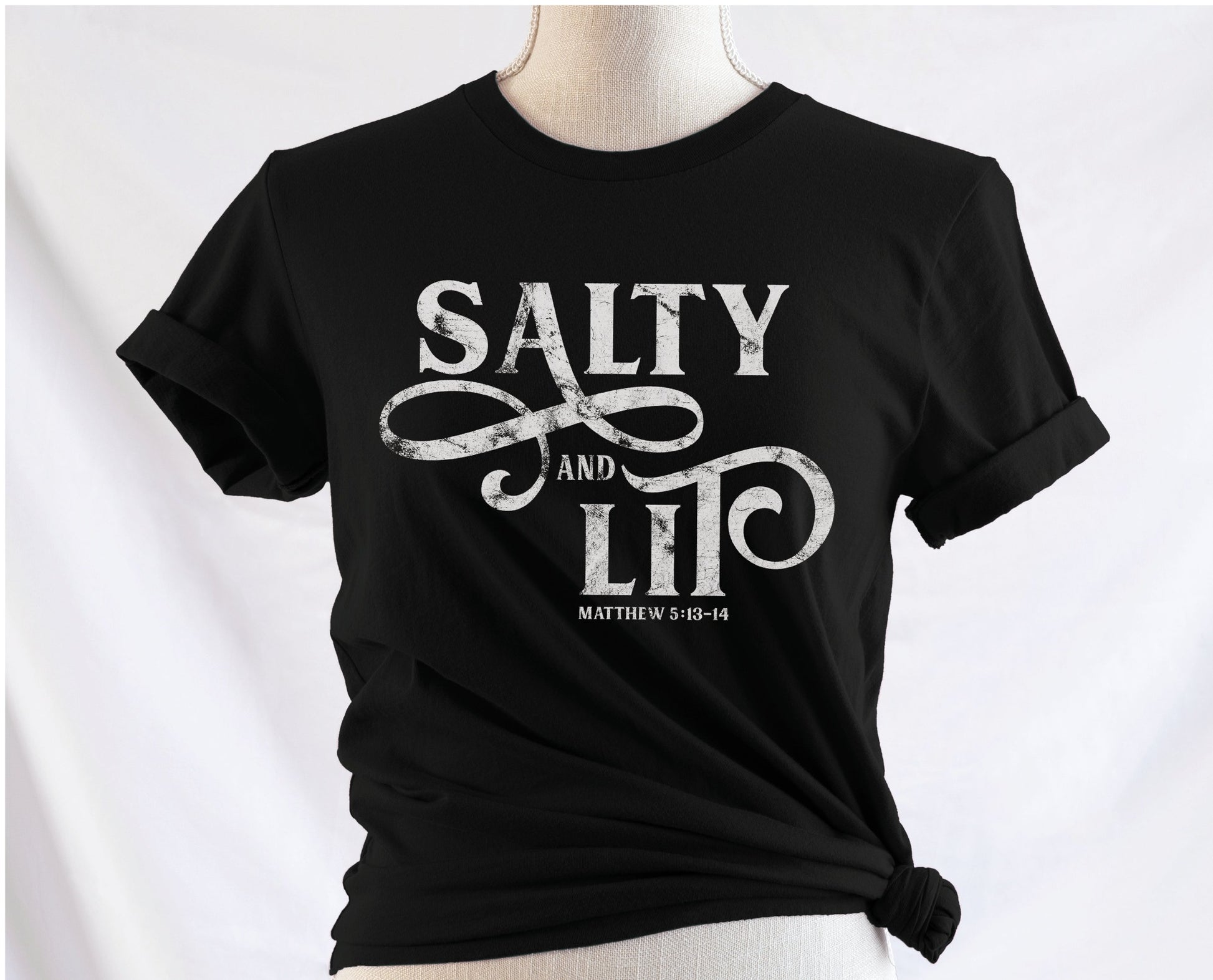 Salty And Lit Matthew 5:13-14 bible verse funny Christian T-Shirt design printed in white on soft black tee for women