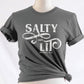 Salty And Lit Matthew 5:13-14 bible verse funny Christian T-Shirt design printed in white on soft asphalt gray tee for women