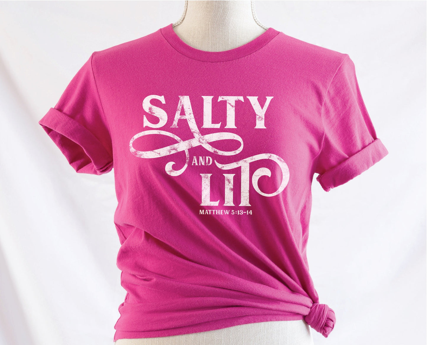 Salty And Lit Matthew 5:13-14 bible verse funny Christian T-Shirt design printed in white on soft berry hot pink tee for women